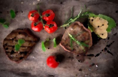 Grilled steaks, fresh herbs and tomatoes